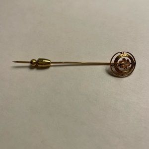 Vintage gold stickpin with tiny diamond center